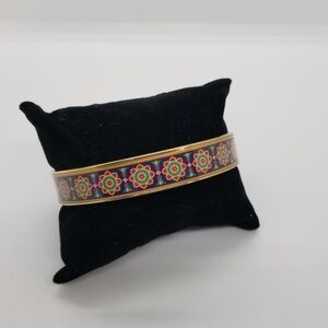 Vera Bradley gold tone bangle with red green and blue floral pattern